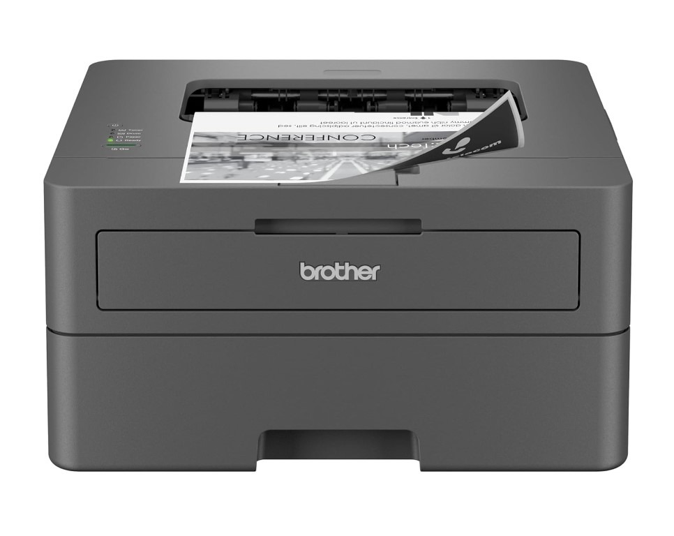 Brother laser printer on white background.