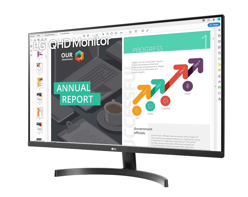 LG QHD monitor displaying an annual report slide.